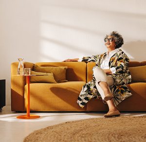 Mature businesswoman smiling happily in an office lobby